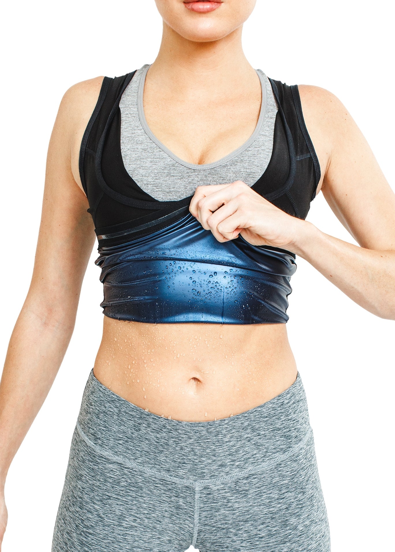 Femme Athlétique En Sweat à Capuche Gris Montrant Son Ventre Musclé Femme Athlétique En Sweat à Capuche Gris Montrant Son Ventre Musclé